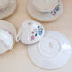 6 coffee cups and saucers Digoin flower patterns