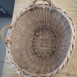 Old wicker basket with 3 handles.