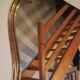 Mirror with golden mouldings