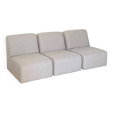 3 gray foam armchairs