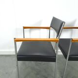 Chaises DDR avec base chromée et revêtement noir, chaises de salle à manger