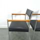 Chaises DDR avec base chromée et revêtement noir, chaises de salle à manger