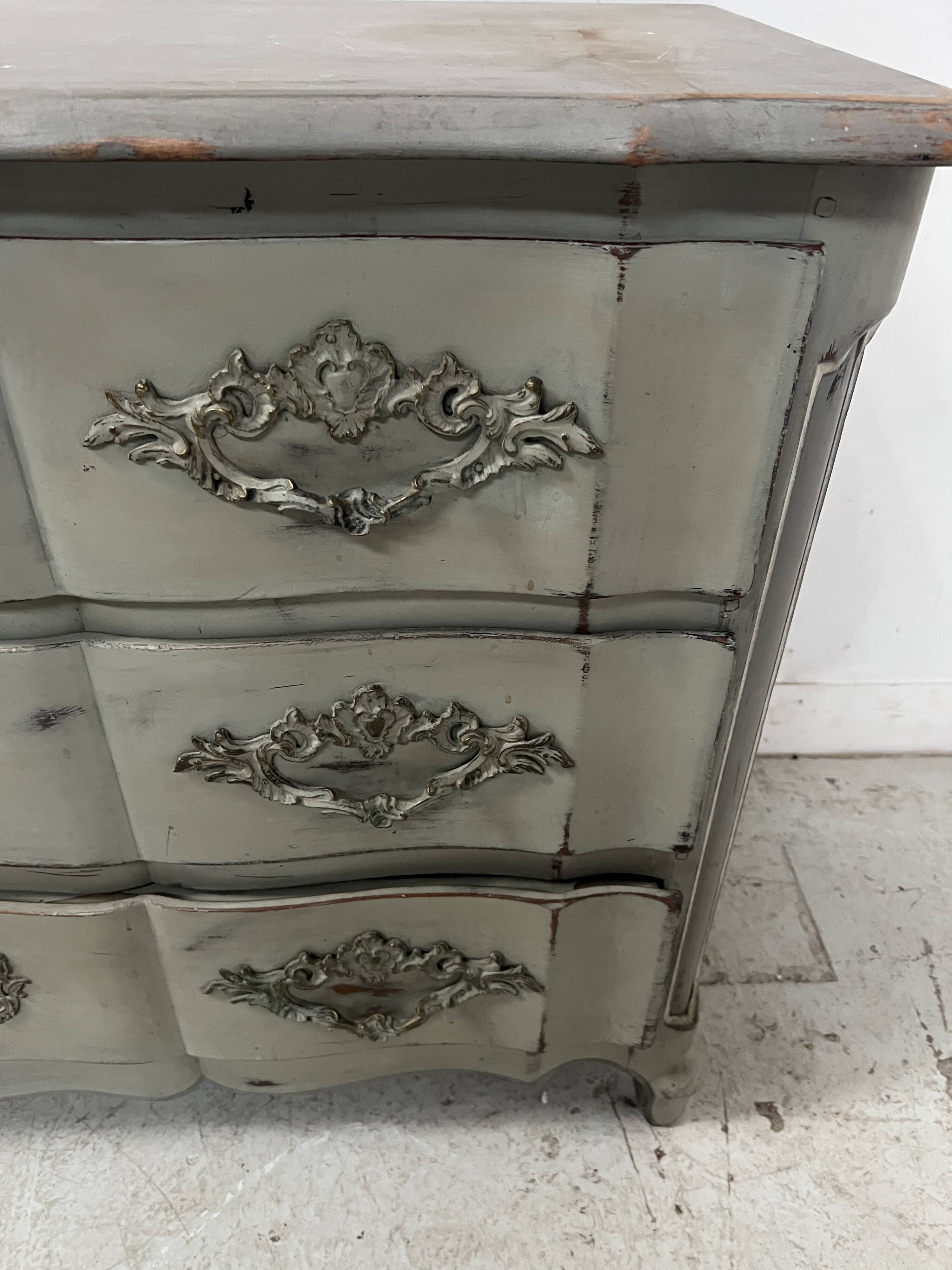 Louis XV style crossbow commode in patinated oak, 20th century.
