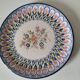 Hand-painted earthenware plate, floral bouquet