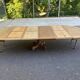 Round dining table with a central pedestal, stripped raw oak, 4 extensions, 19th century.