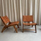 Pair of leather and walnut armchairs
