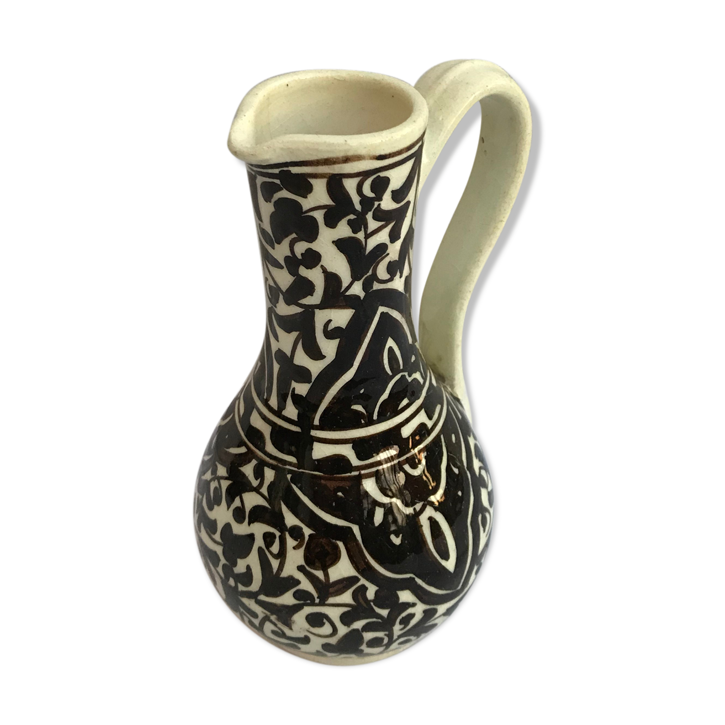 Former beige cracked ceramic pitcher