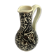 Former beige cracked ceramic pitcher