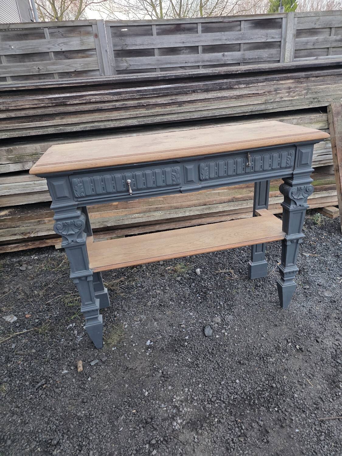Console in patinated solid oak, late 19th century.