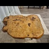 Tripod coffee table in natural solid elm magnifying glass