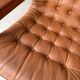 Vintage lounge chair in teak and leather from the 1960s.