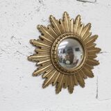 Vintage 1970s convex witch's eye sunburst mirror