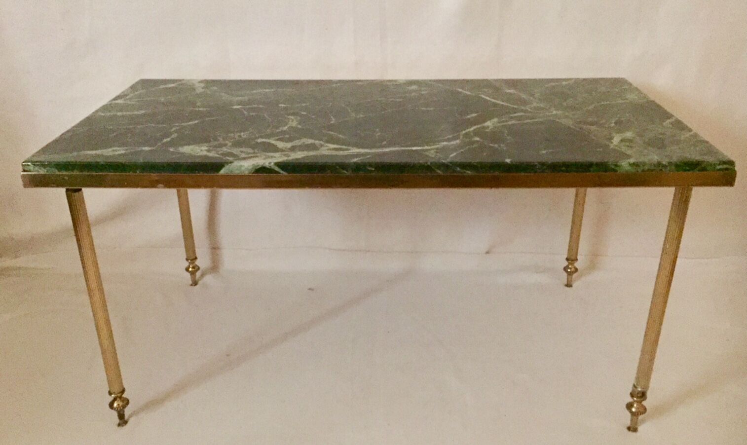 Green marble and gilded brass coffee table