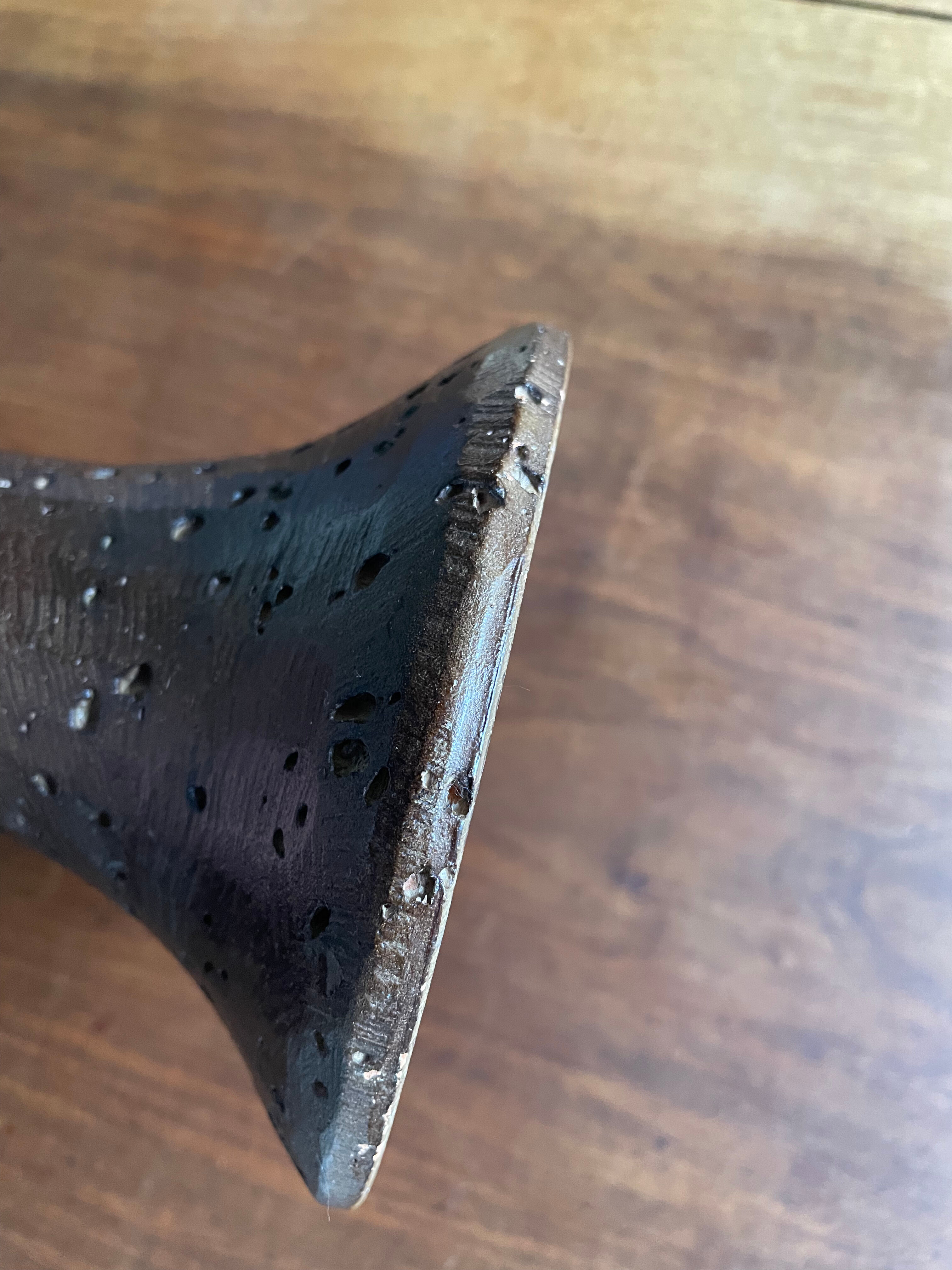 Brown enamelled terracotta candle holder