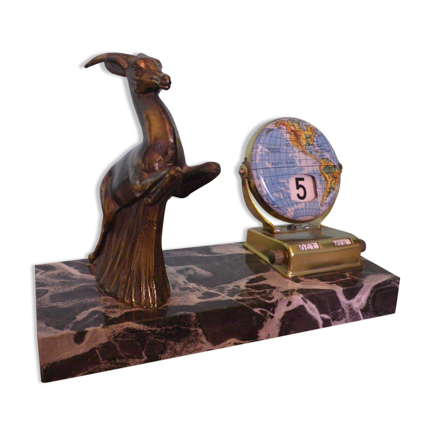 Perpetual calendar on marble base with marble patinated regulated decoration, 60s
