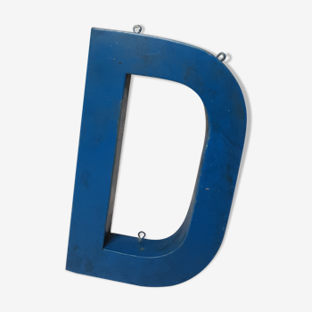 Old letter d in blue zinc