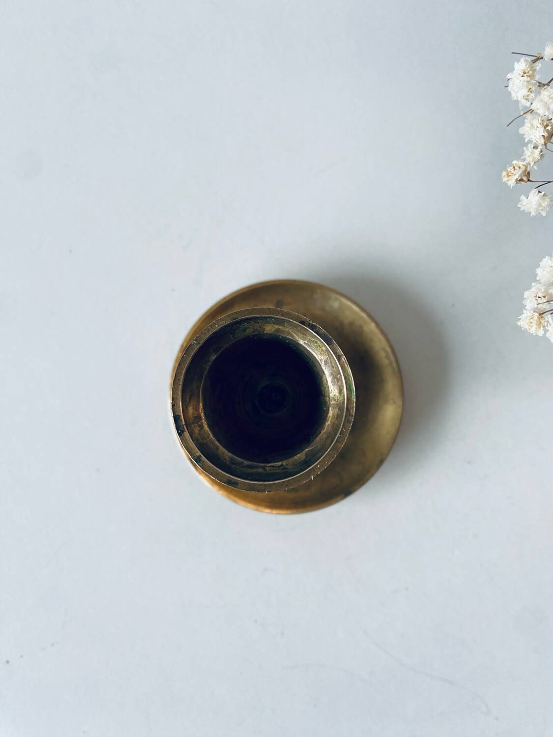 Golden brass candle holder