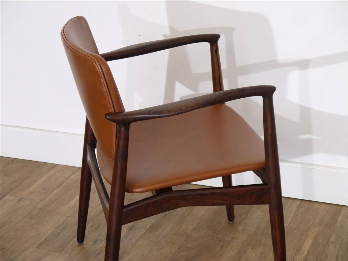 Danish armchair in Rio rosewood by Erik Buch