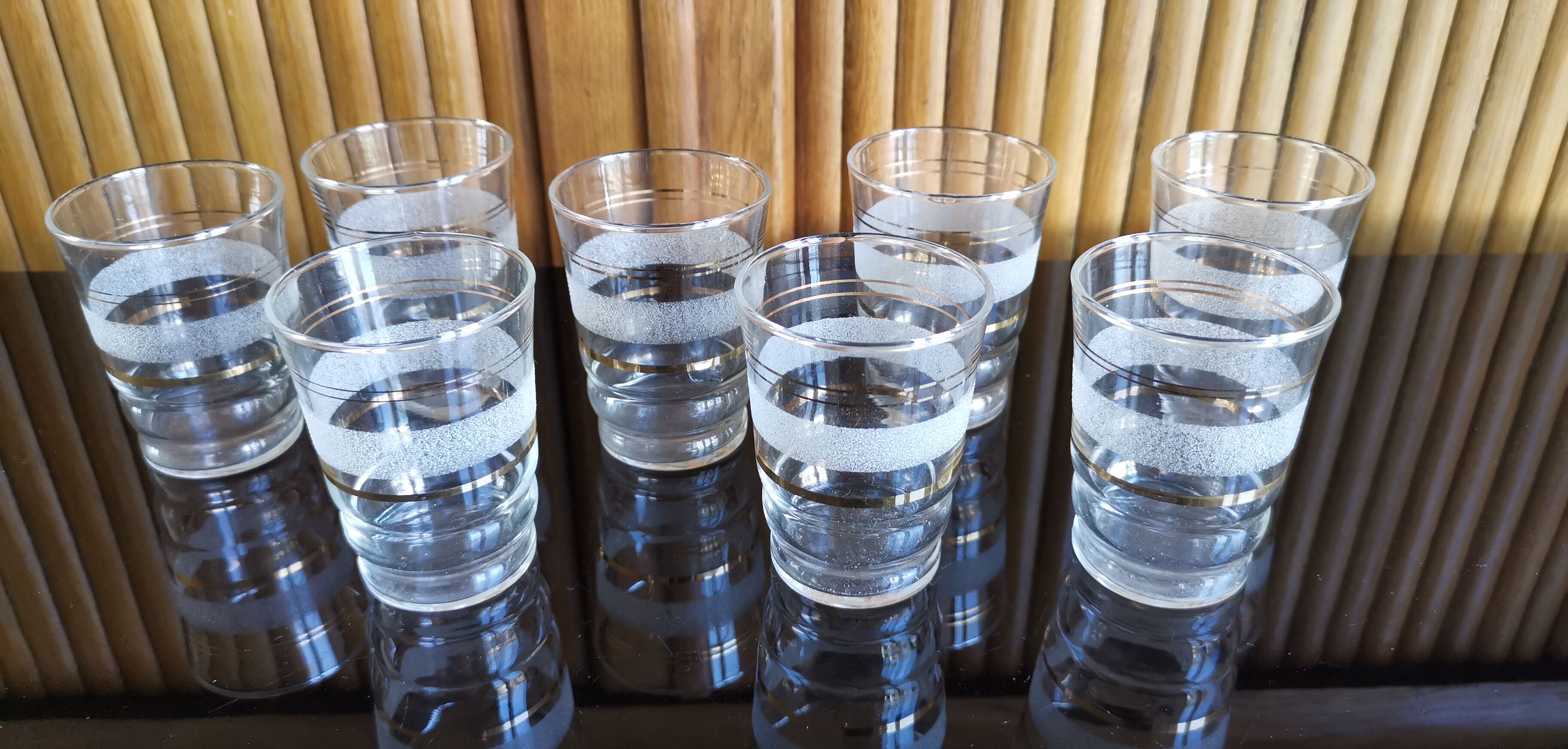 8 granite glasses bordered gold 1950s