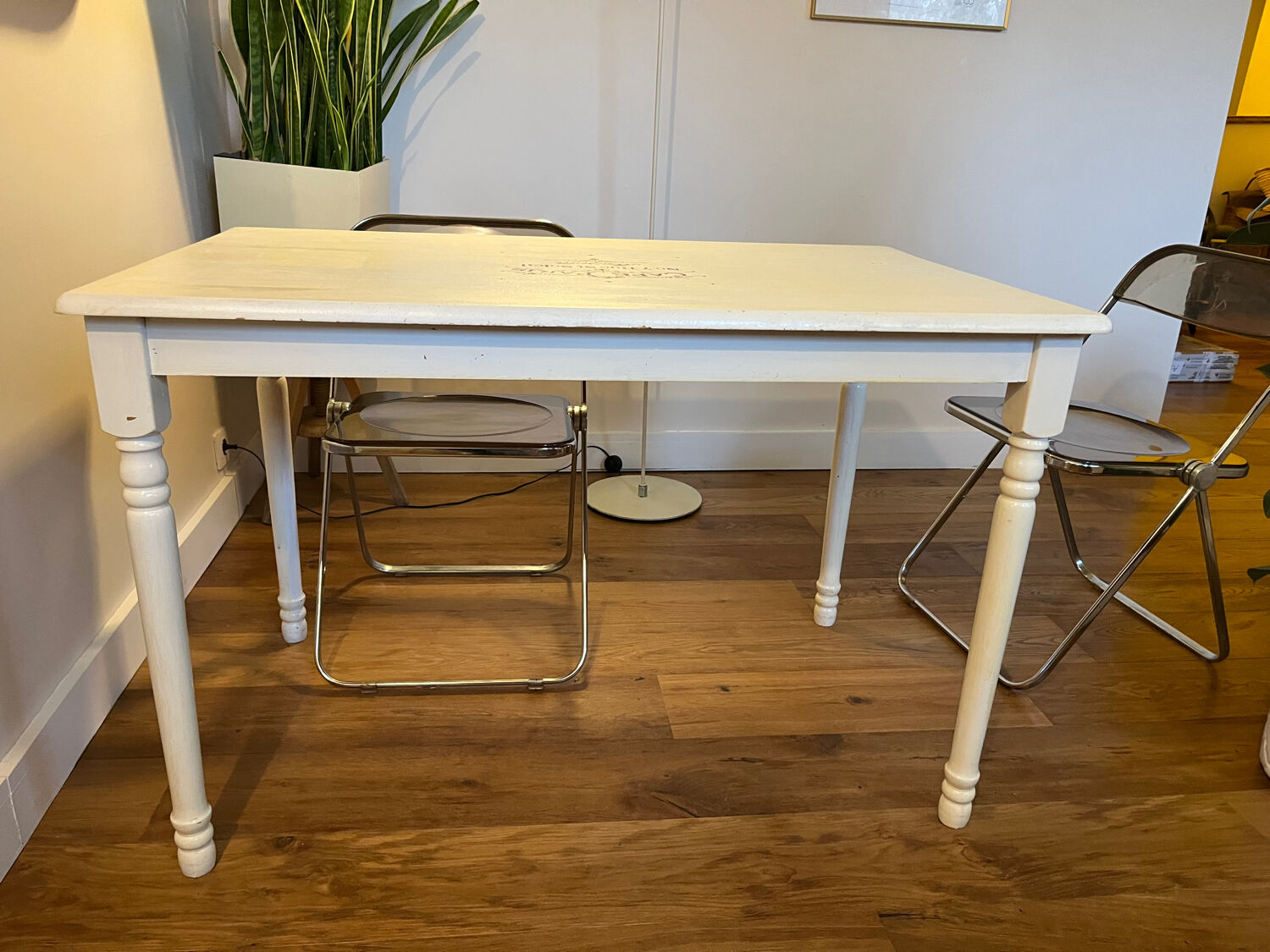 Farm table with a cream patina.