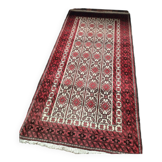 Oriental carpet knotted with red hand