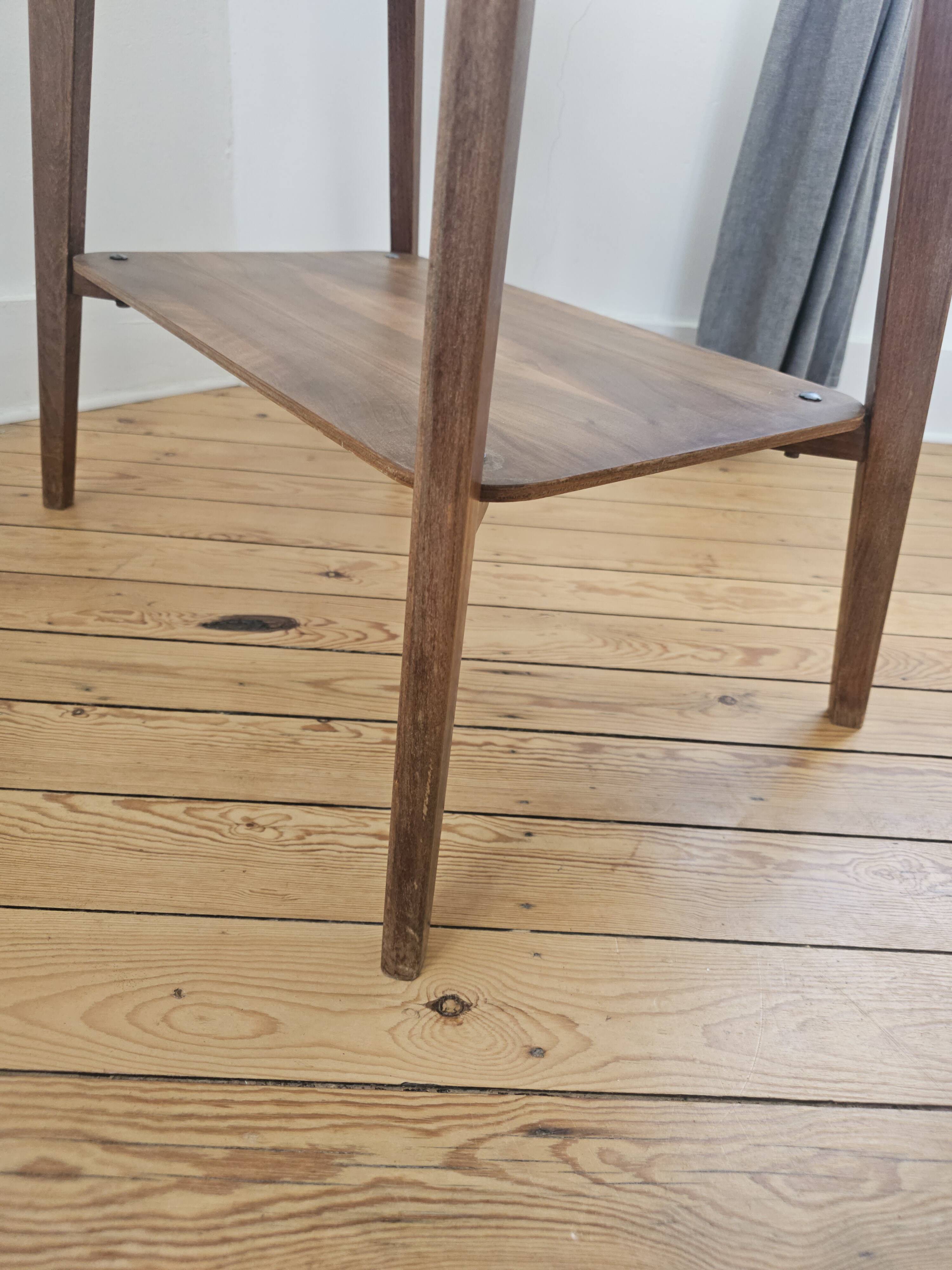 Vintage side table with double top in Scandinavian style.