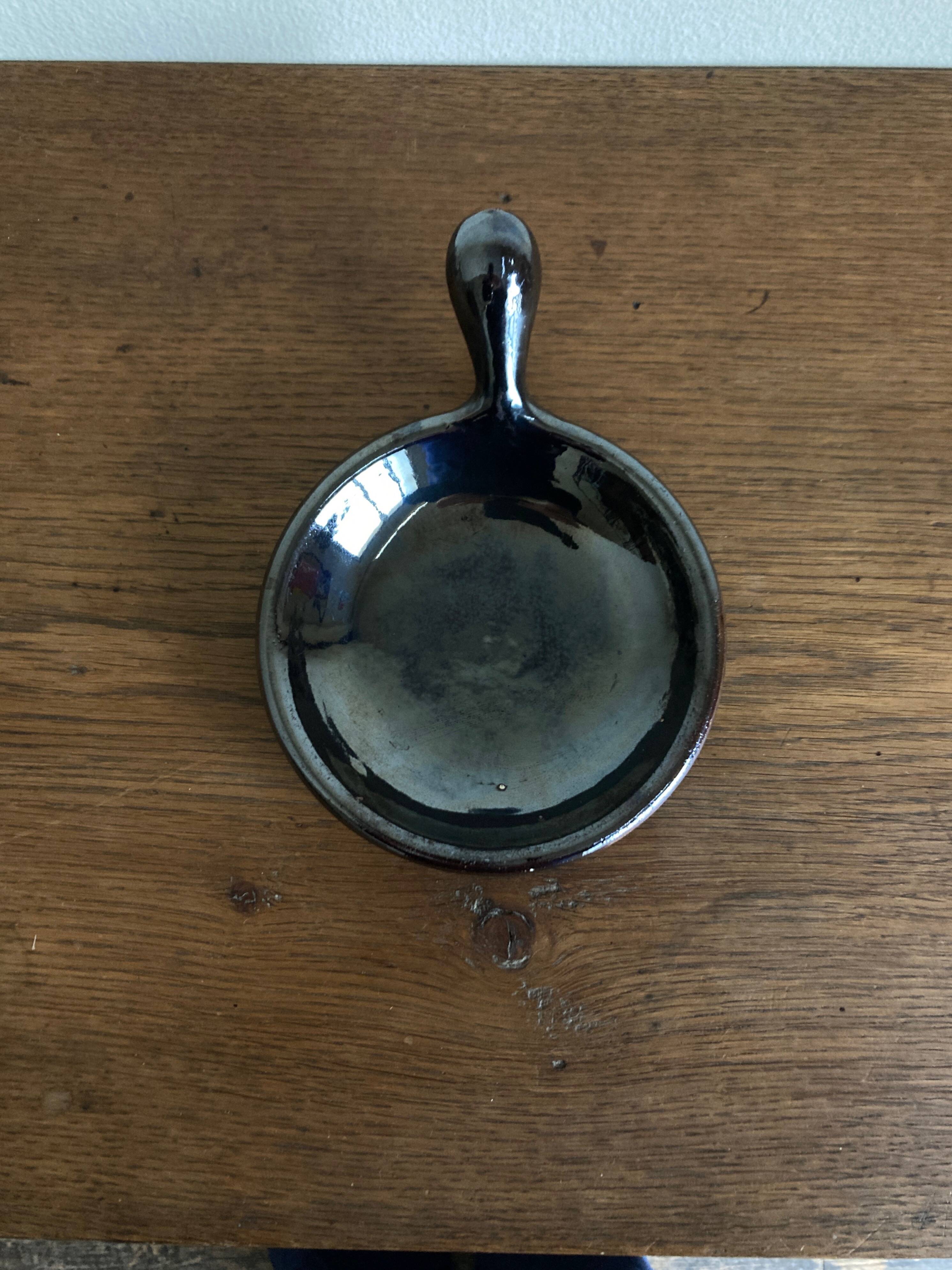 Black glazed earthenware dish 1960