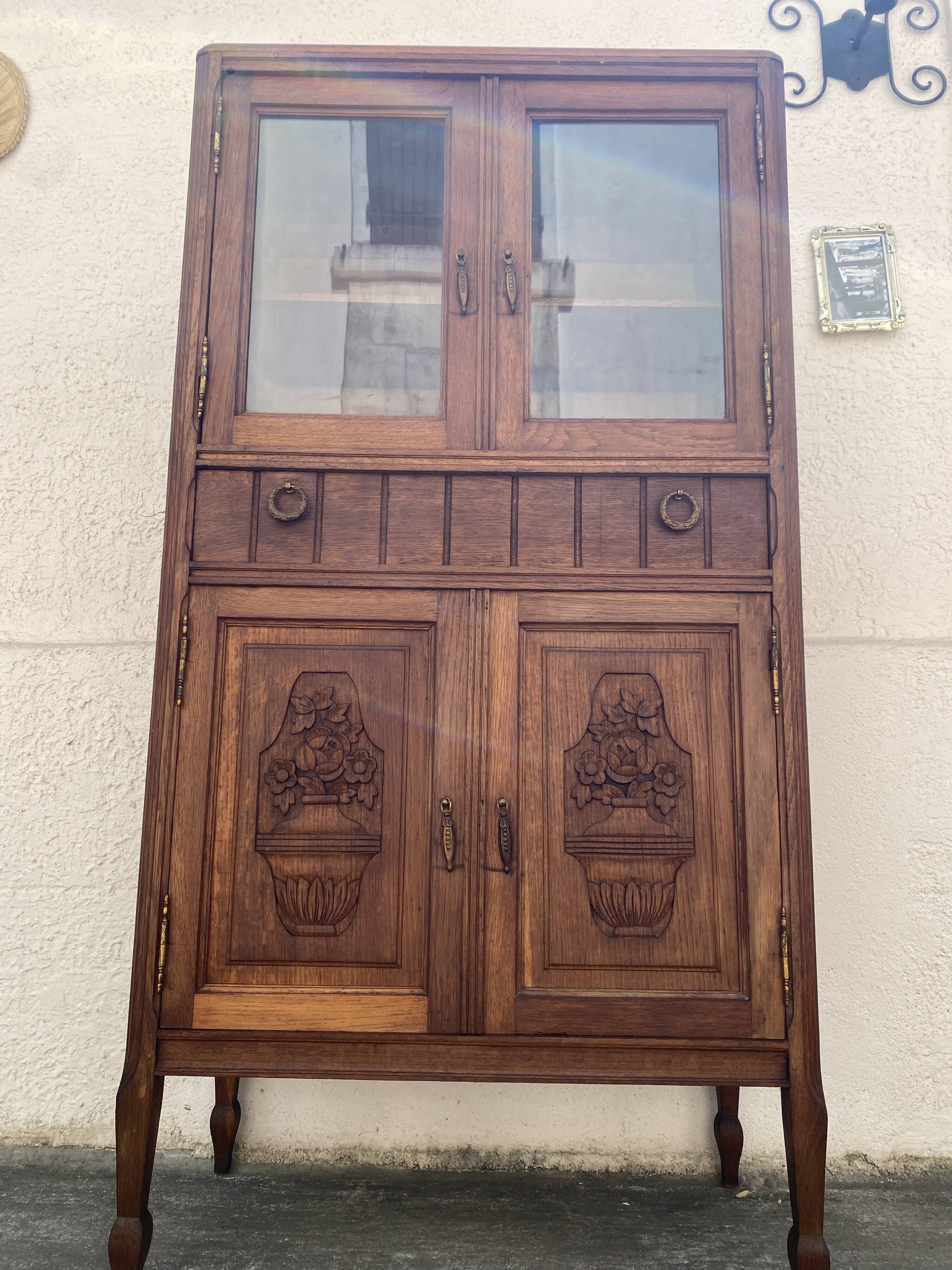 Old small glass display cabinet from the early 20th century.
