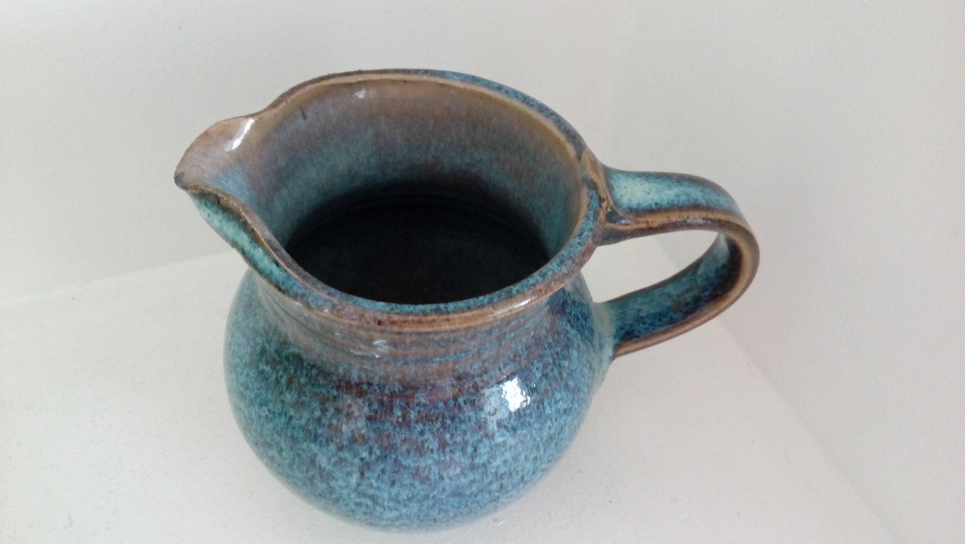 Pitcher in enamelled blue sandstone