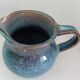 Pitcher in enamelled blue sandstone