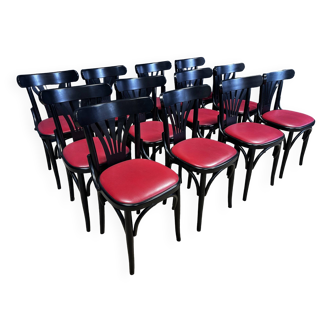 Lot de 12 chaises bistrot a palmettes noires et skaï rouge France