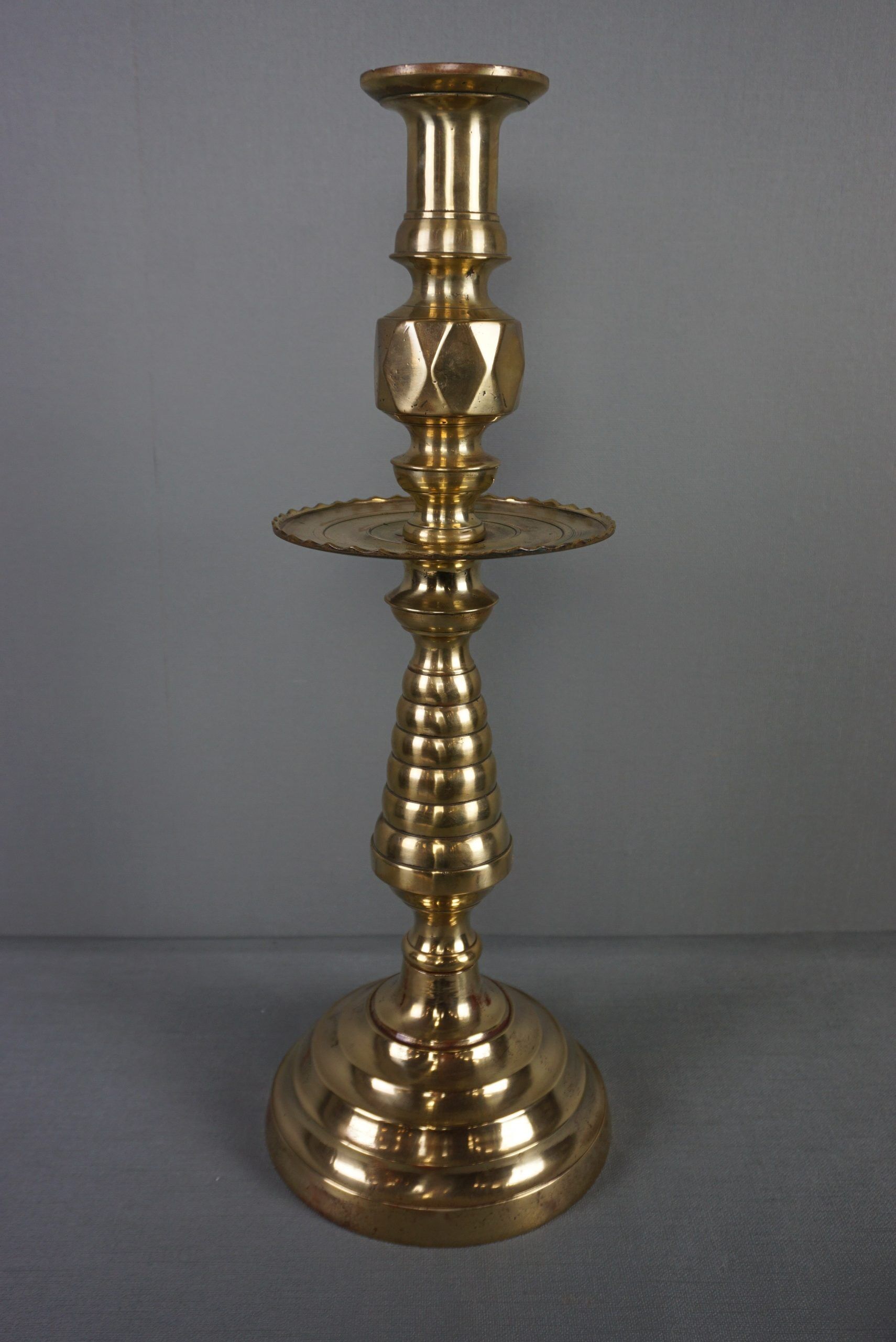 Old yellow copper neck candle holder