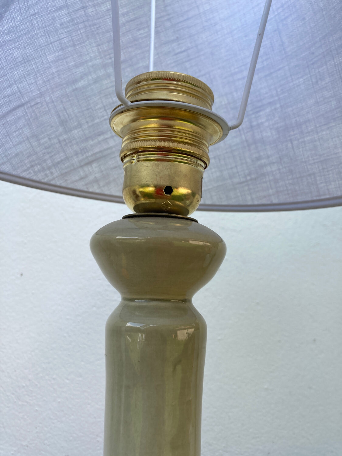 Beige ceramic lamp and iridescent white lampshade