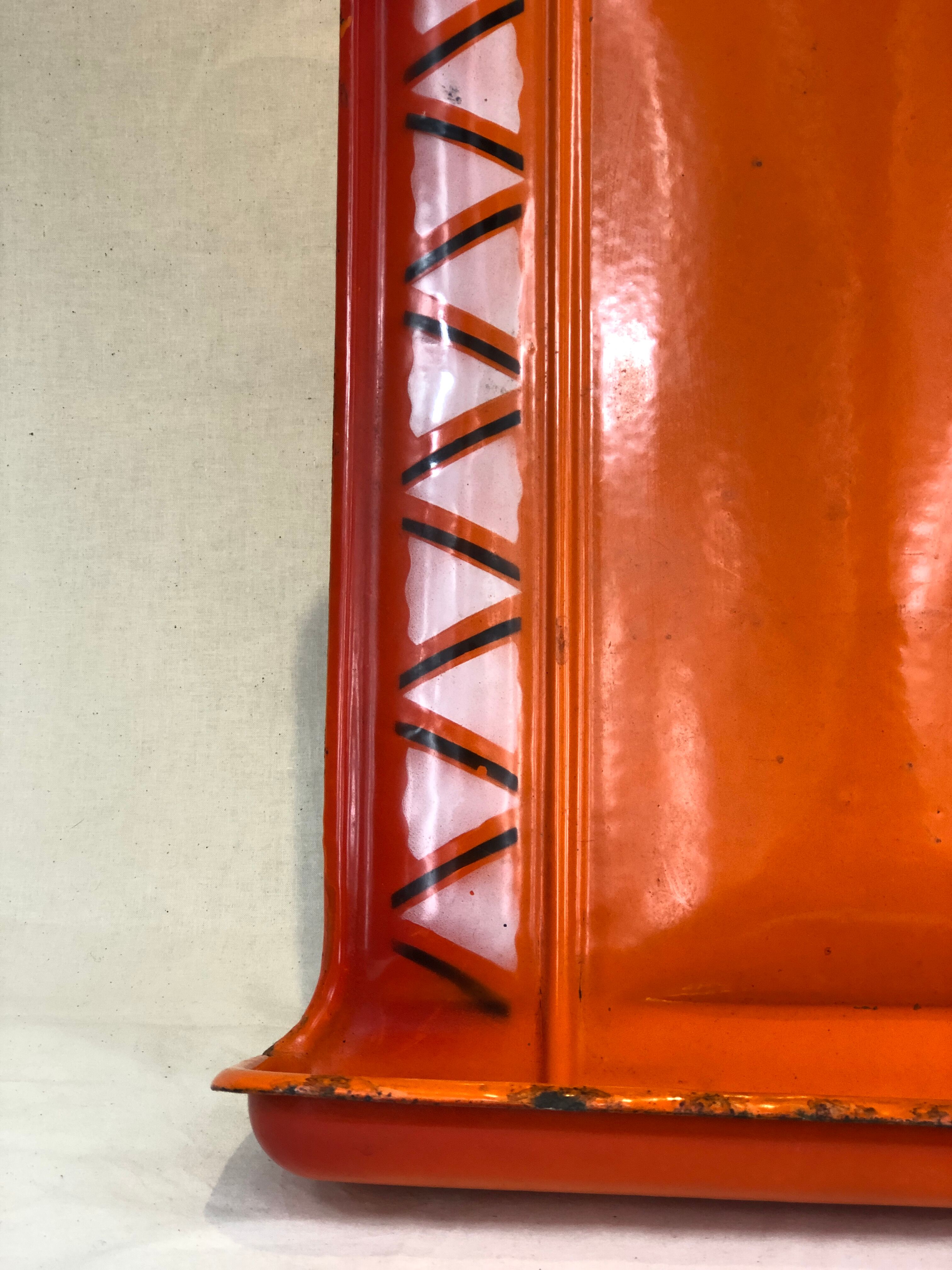 Ladle holder in vintage orange enamelled sheet metal