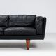 Illum Wikkelso model V11 sofa in black leather by Holger Christiansen, Denmark, 1960