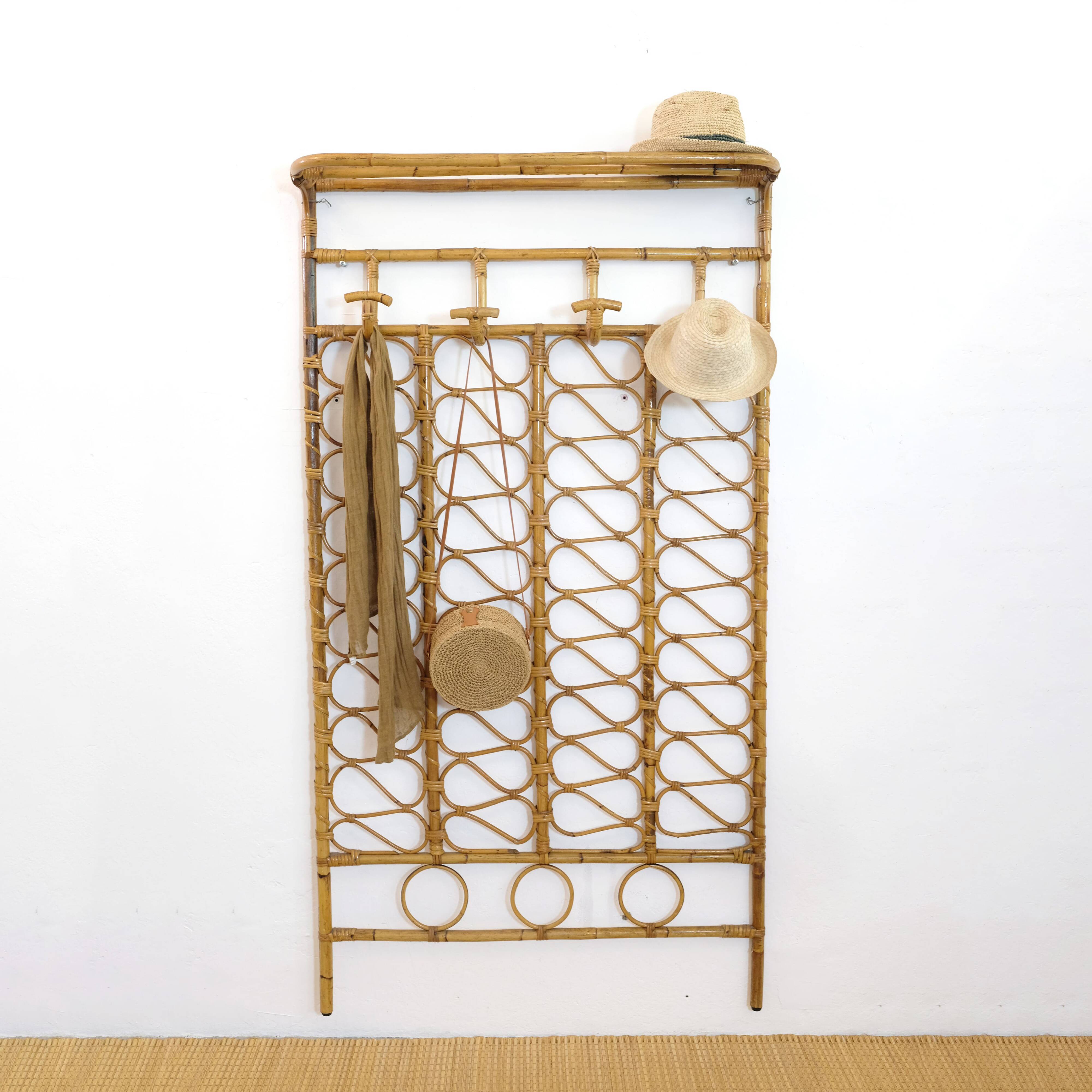 Large rattan wall coat rack, Italy, 1960s.