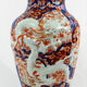 19th century Imari porcelain baluster vase with dragon relief decoration