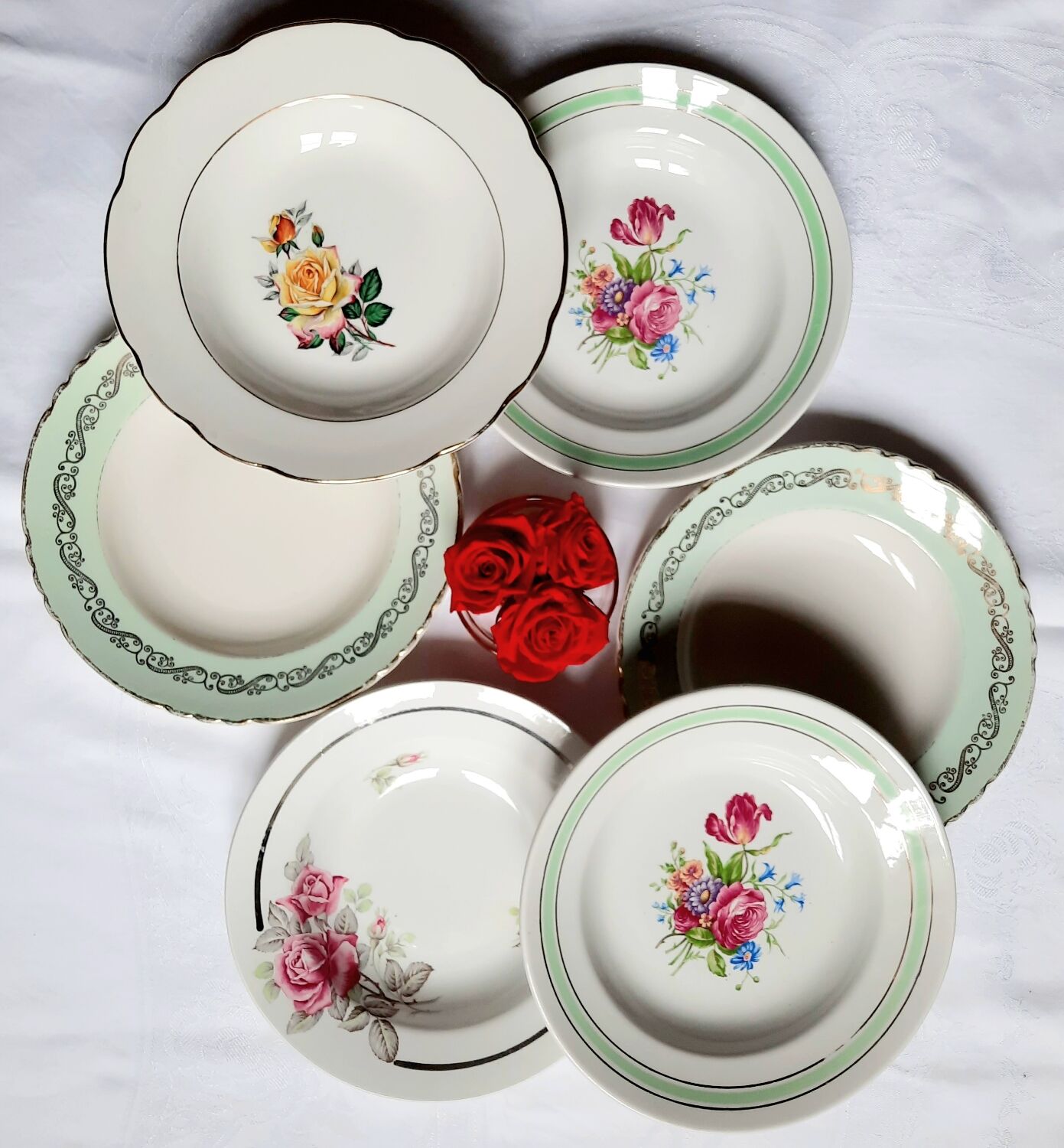 Old hollow plates mismatched in earthenware