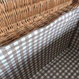 Vintage wicker trunk with burgundy metal closures
