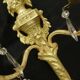 Pair of Louis XVI style tassel sconces, early 1900s - bronze & glass