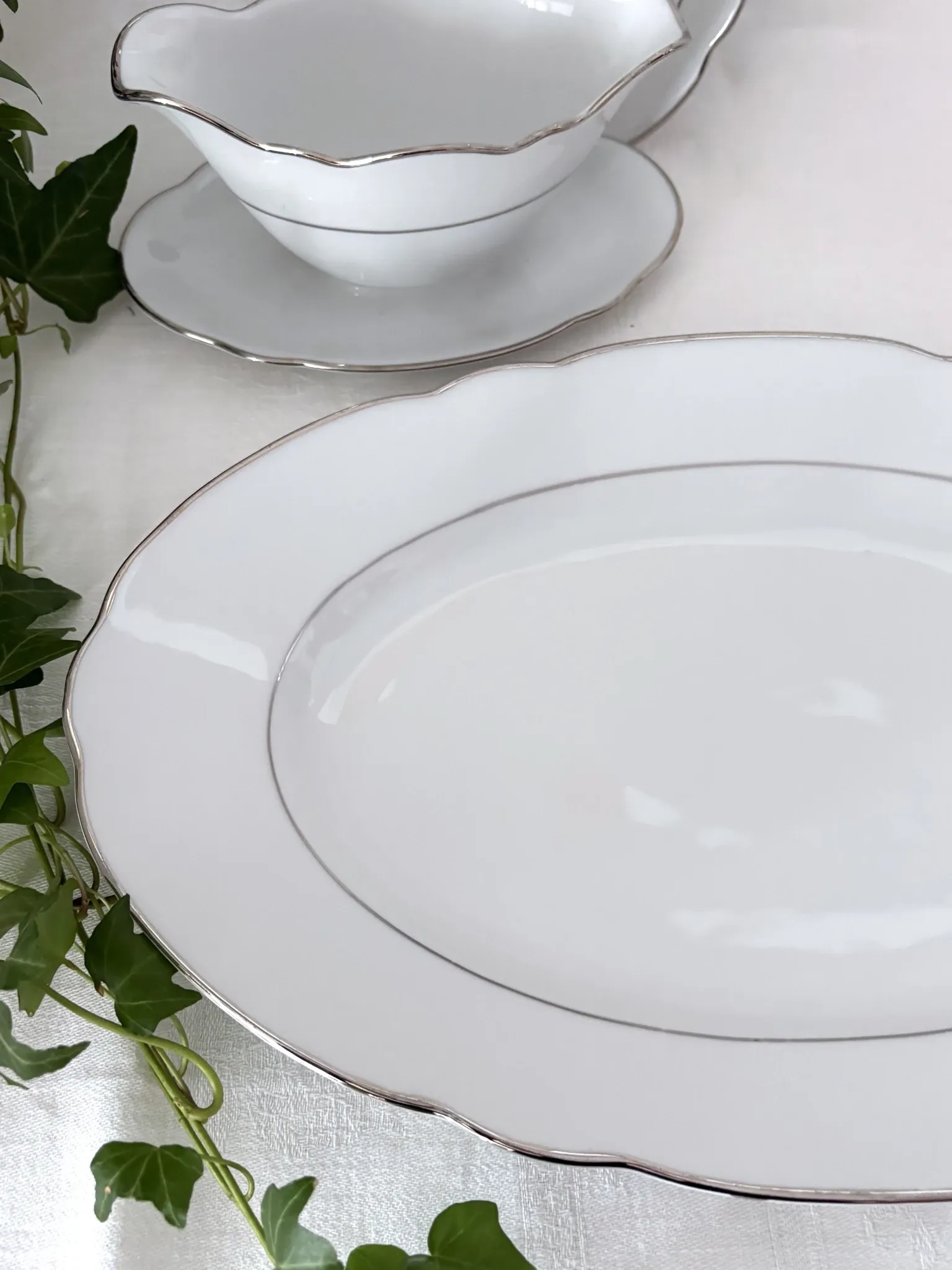 3 white porcelain plates