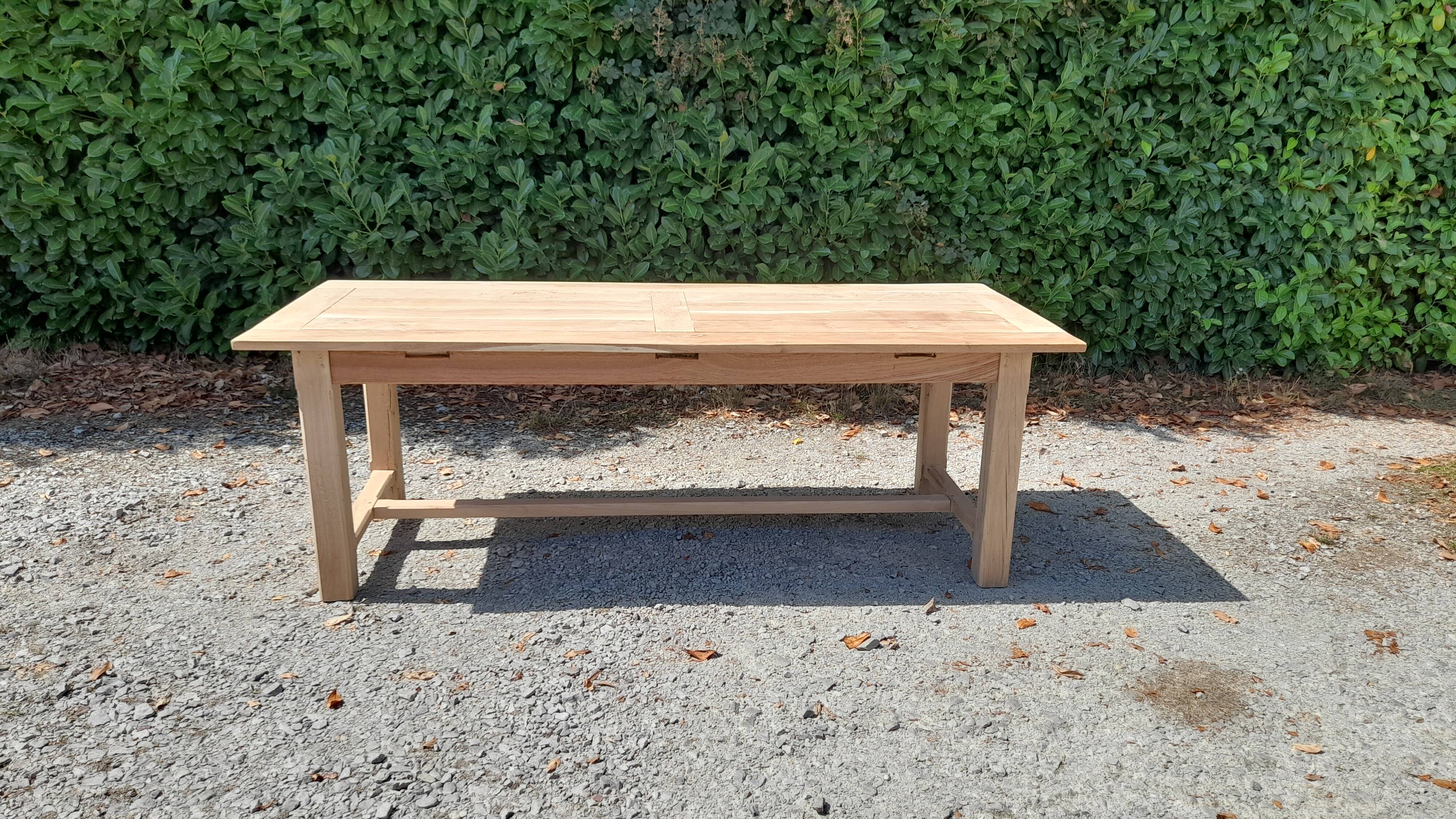 Solid oak farmhouse table in raw wood