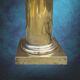 Large vintage brass lamp base in neoclassical column style with a copper socket.