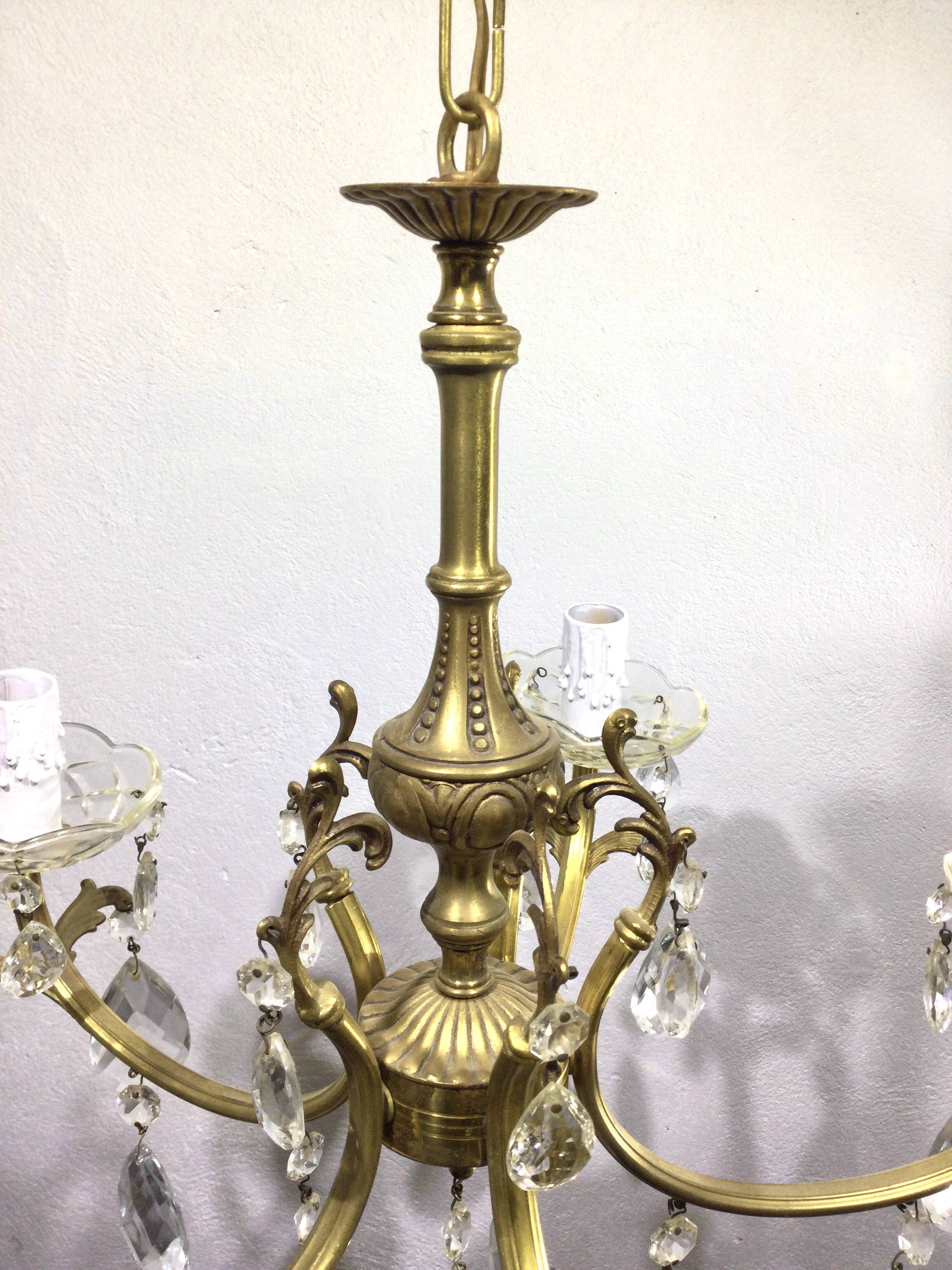 5-light chandelier in brass and tassels