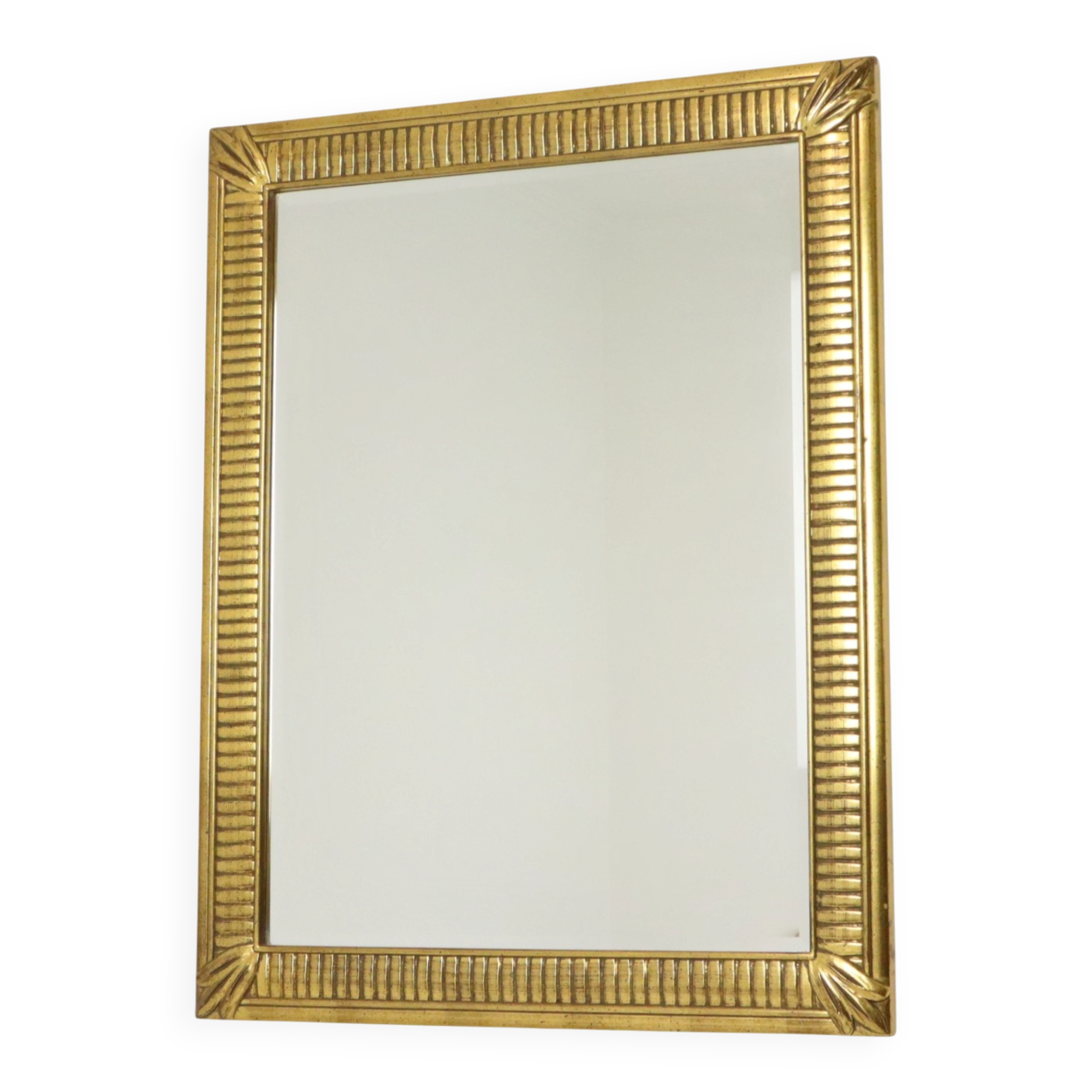 Miroir Deknudt en or Hollywood Regency biseauté 92 cm