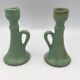 Pair of vintage table candle holders in green enameled ceramic