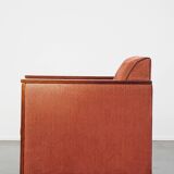 Art Deco design armchair with red fabric upholstery and wooden details