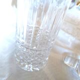 Small round carafe in highly worked cut crystal with stopper