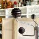 Space Age coat rack with 8 hooks in chrome-plated metal and brown bakelite