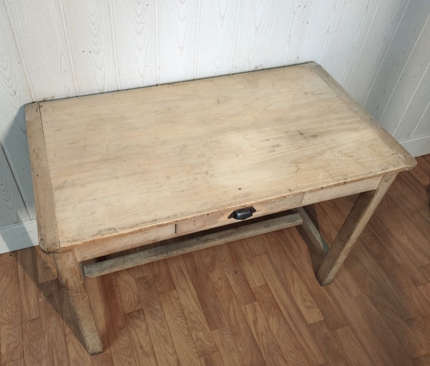 Antique farmhouse table in raw wood
